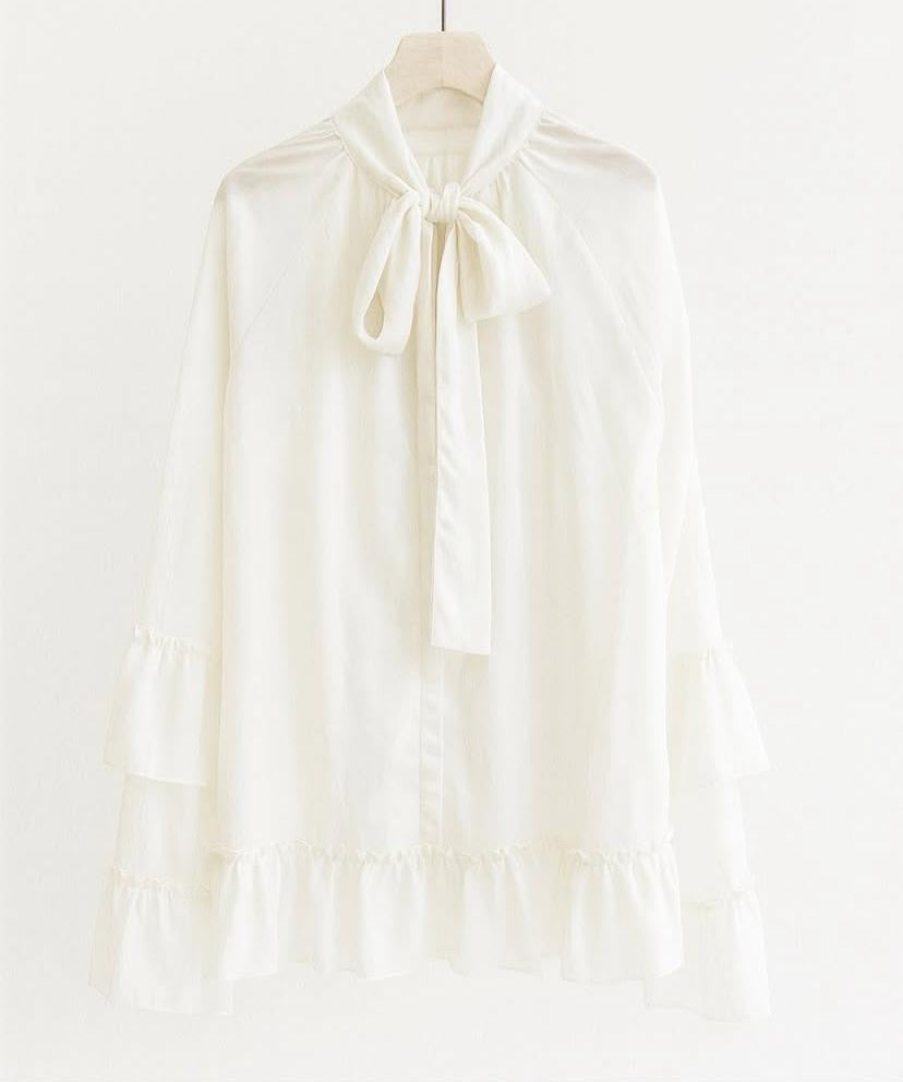 Blusa semitransparente lazo