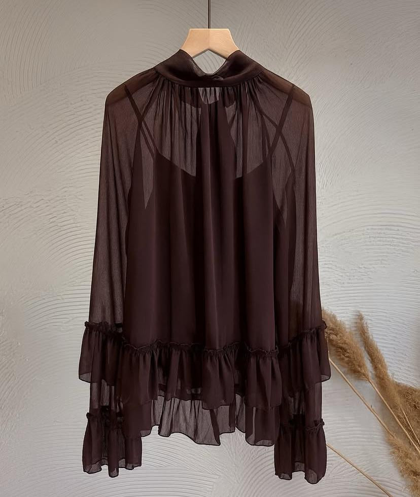 Blusa semitransparente lazo